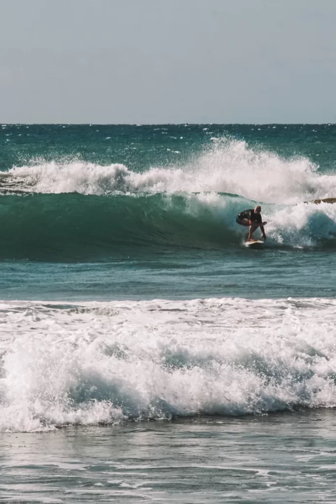 Surfer at main point arugam bay