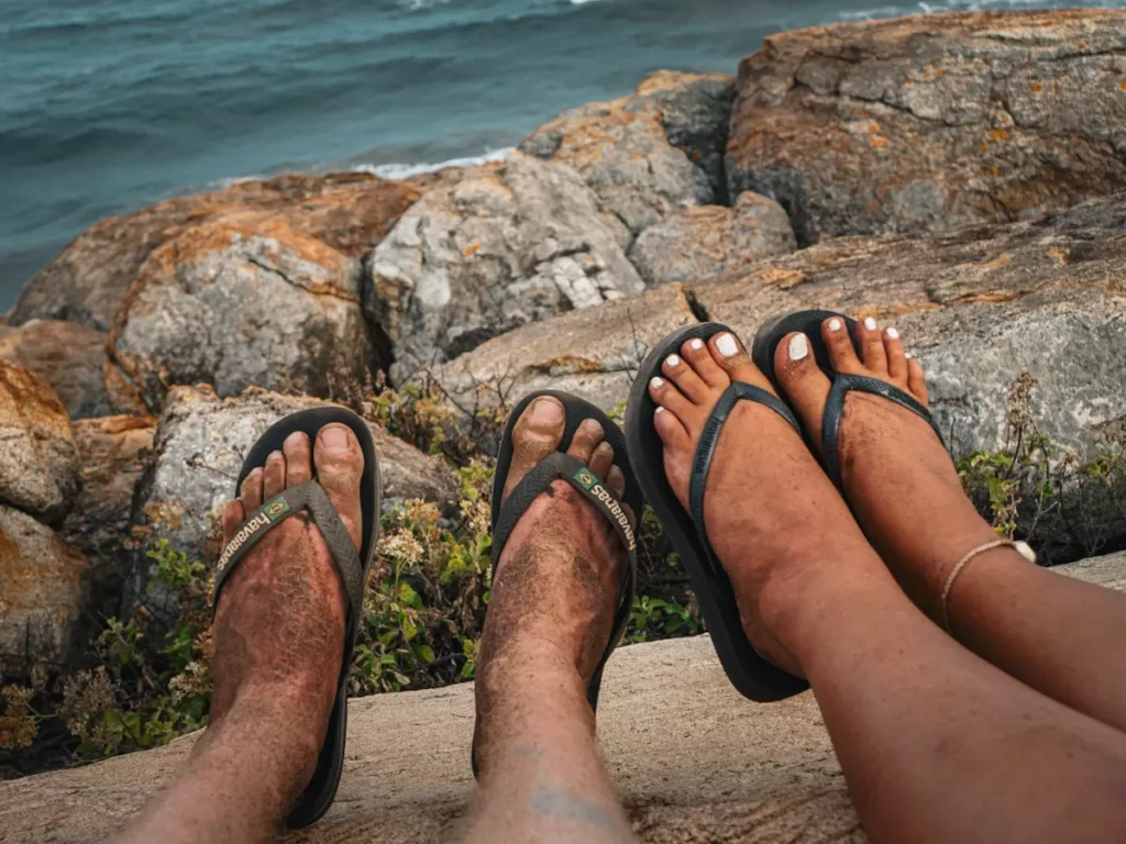 Two peoples dusty and dirty feet after climbing Elephant Rock