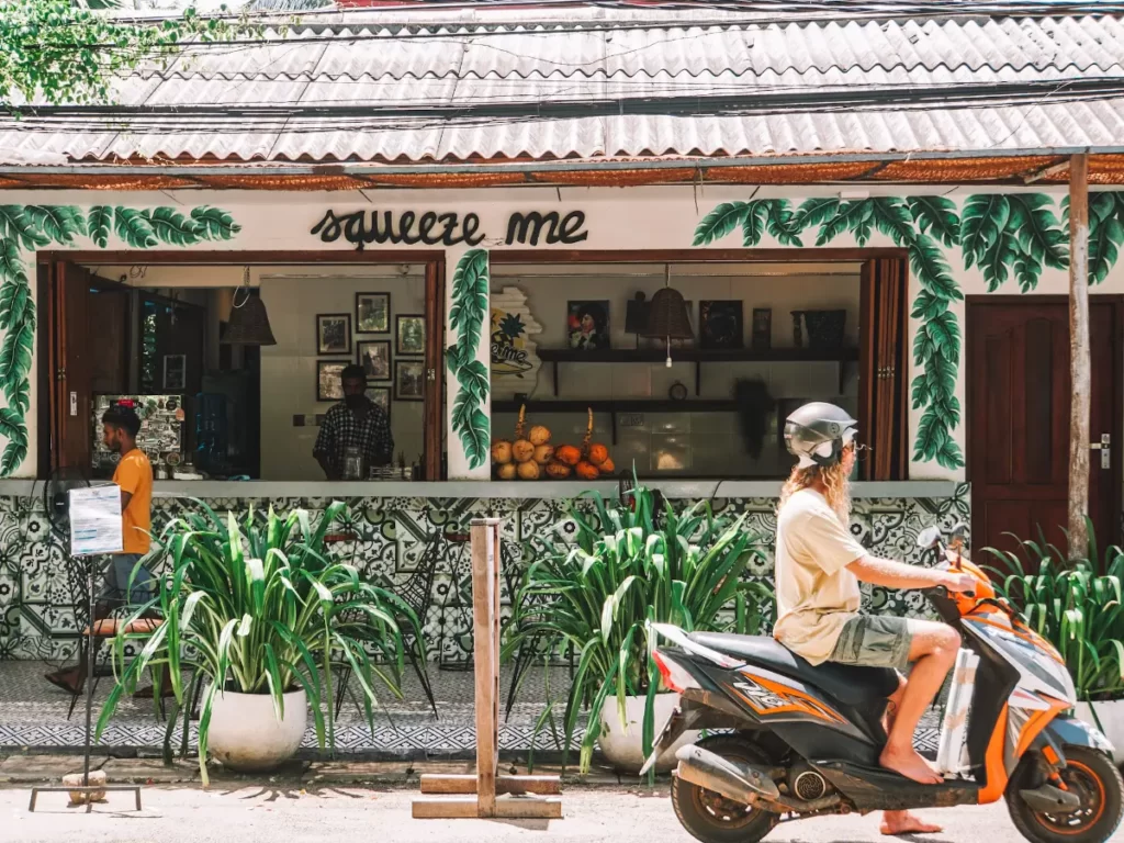 The mismatched tiles of Squeeze Me's seating terrace, one of the best restaurants in Arugam Bay