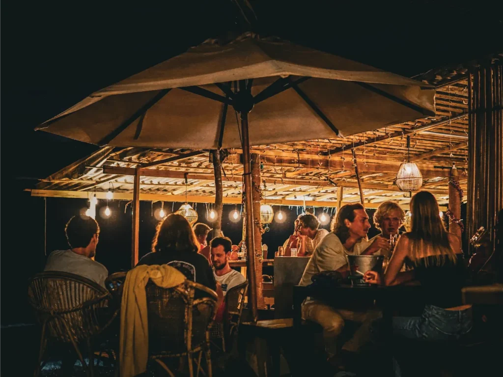 Two groups of friends drinking beers and having fun in The Pickled Pelican