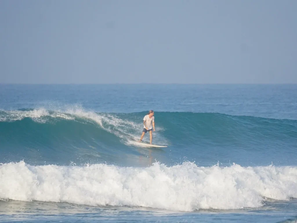 A surfer hitting a big wave at Marshmallow surf spot