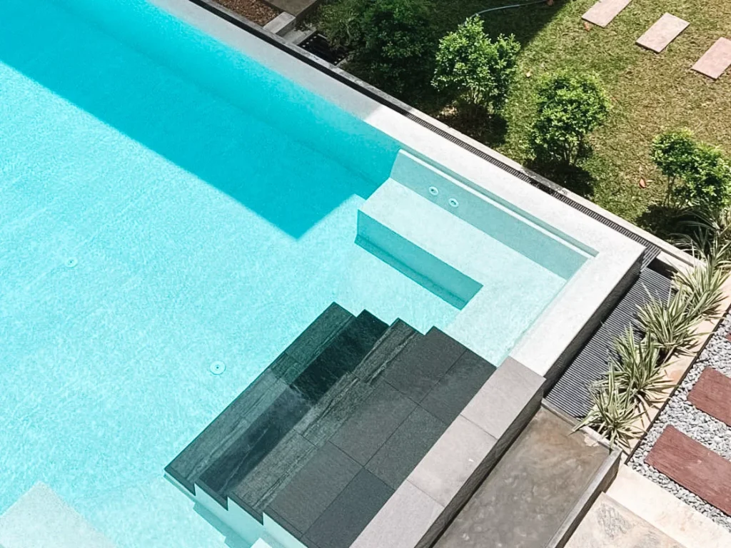 The pool and garden area of Lum Residence, a top place to stay near Kabalana Beach