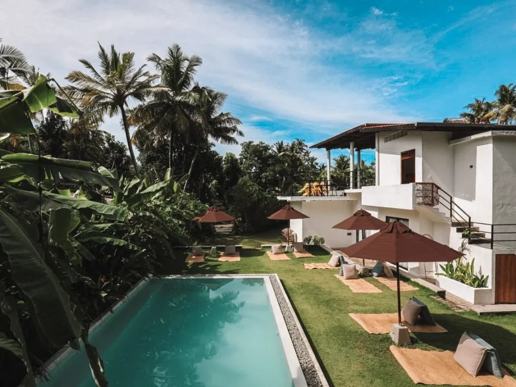 The pool and outdoor space at The Well, one of the best hostels near Kabalana Beach