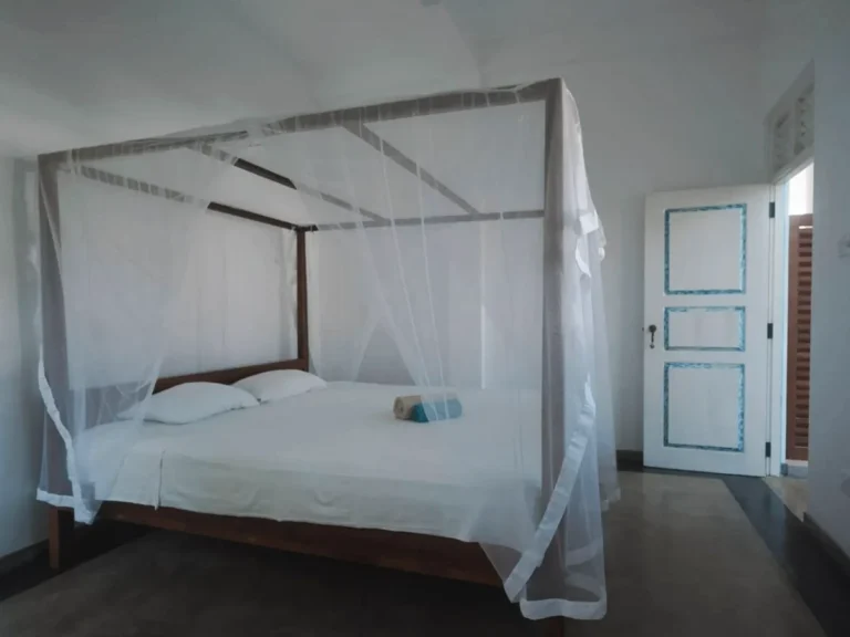 The bedroom at Casa Tharin in Madiha