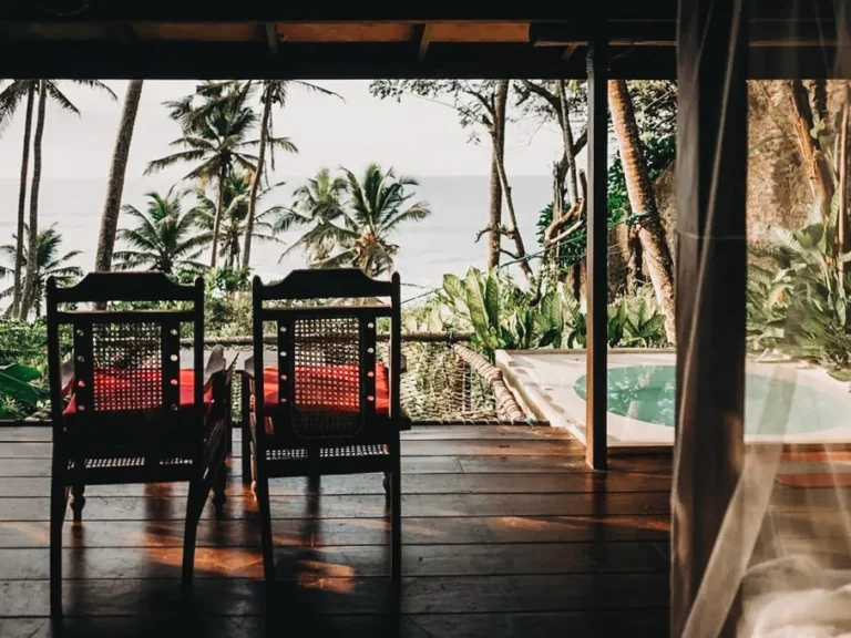 The seating areas and views of the ocean at See More Treehouse in Madiha