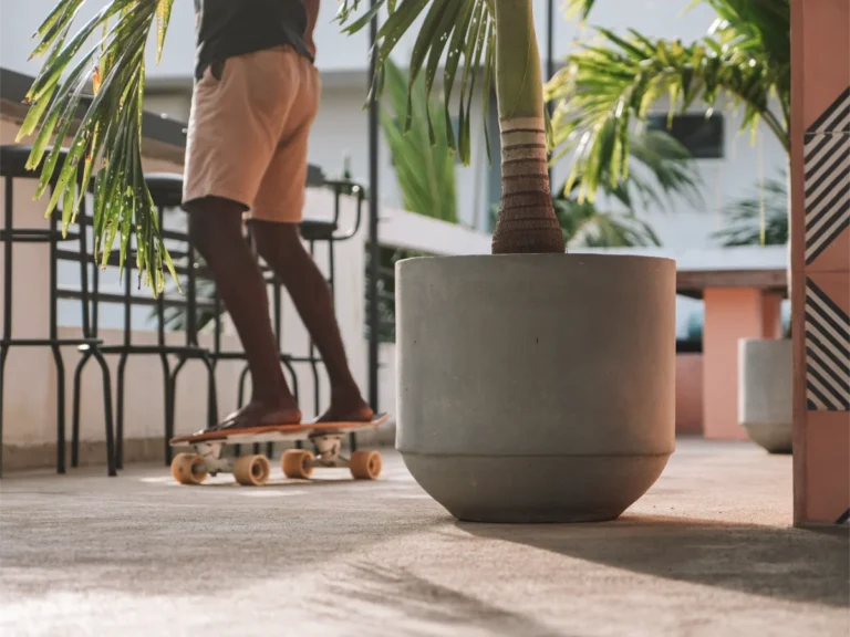 A guy skateboards around Spindrift rooftop