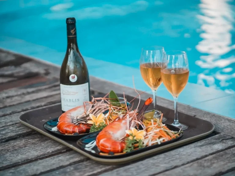 Wine a lobster served poolside at Villa Oceane